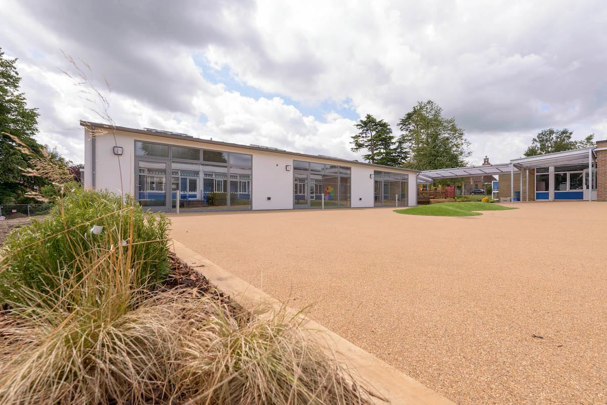 Modern school building with outdoor space.
