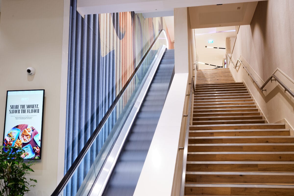 staircase and escalators up to hotel lobby